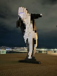 Digital Orca in downtown Vancouver at night